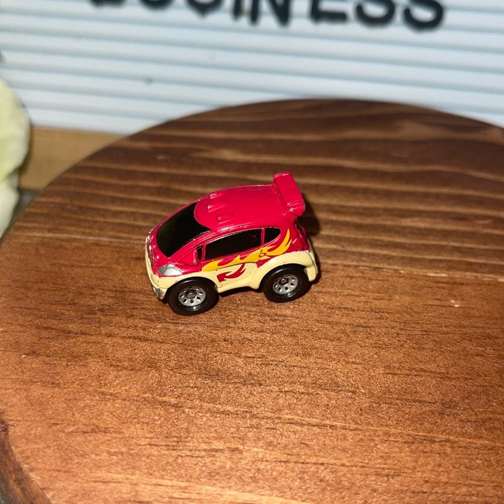 Small Hasbro Micro Machine Mini SUV in Red with Yellow Flames